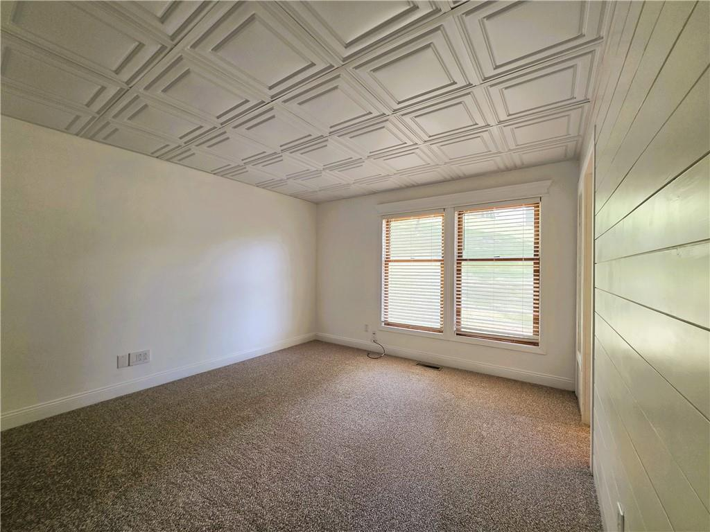 Bedroom before staging — prior listing agent