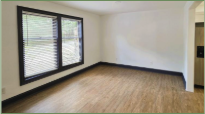 Living room before staging — prior listing agent